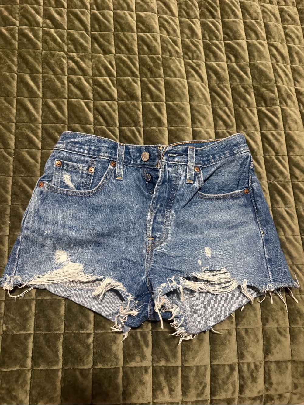 Levi's Distressed Light Blue High-Rise Jean Shorts